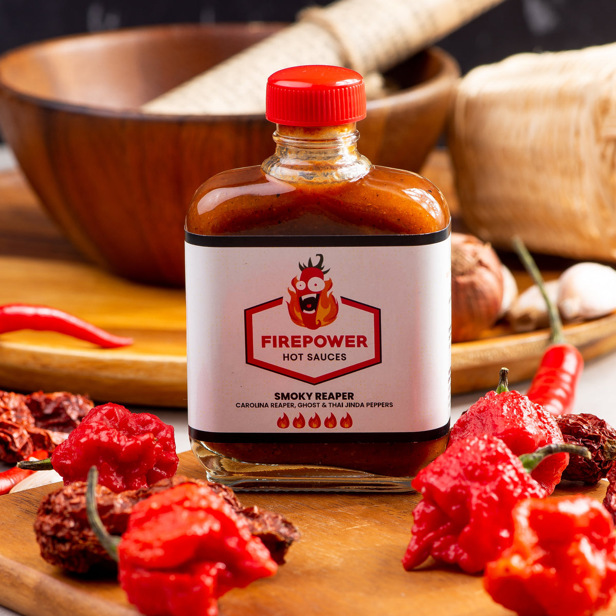 An 85ml bottle of Firepower Smoky Reaper hot sauce — a limited-batch Carolina Reaper sauce made in Bangkok.