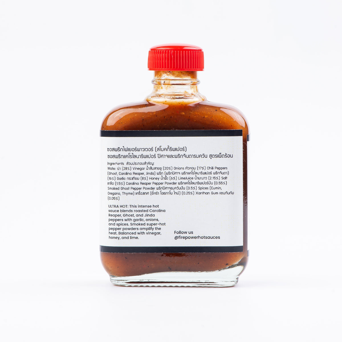 Back of an 85ml bottle of Firepower Smoky Reaper hot sauce — a limited-batch Carolina Reaper sauce made in Bangkok.